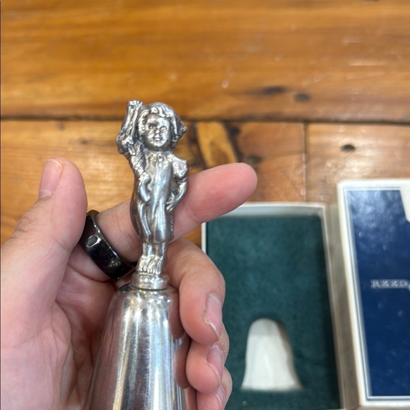Reed & Barton Silver Bell with Toddler holding a sock - Picture 5 of 7